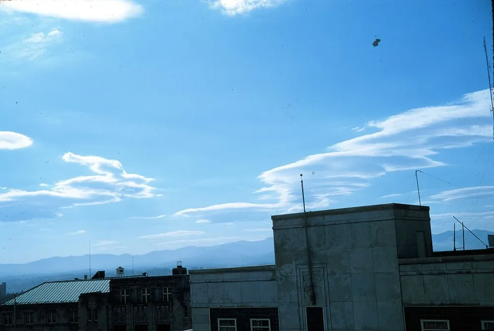 Lenticular clouds mark the crests of mountain waves downwind of high terrain